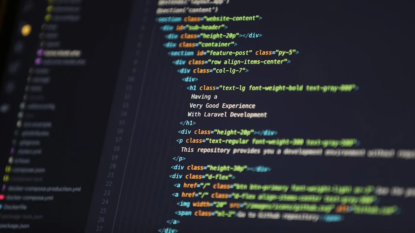 Computer screen displaying HTML code for a web development project
